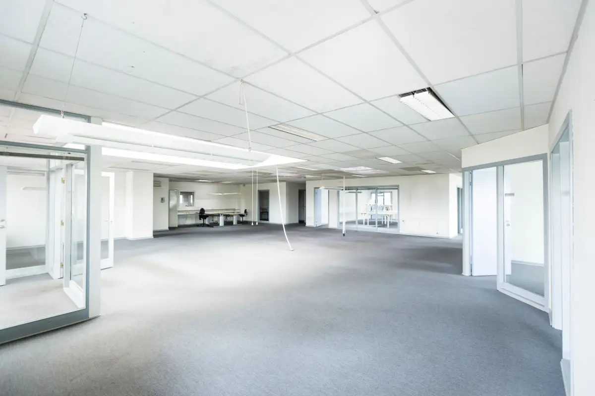 Bright commercial office space with glass partitions